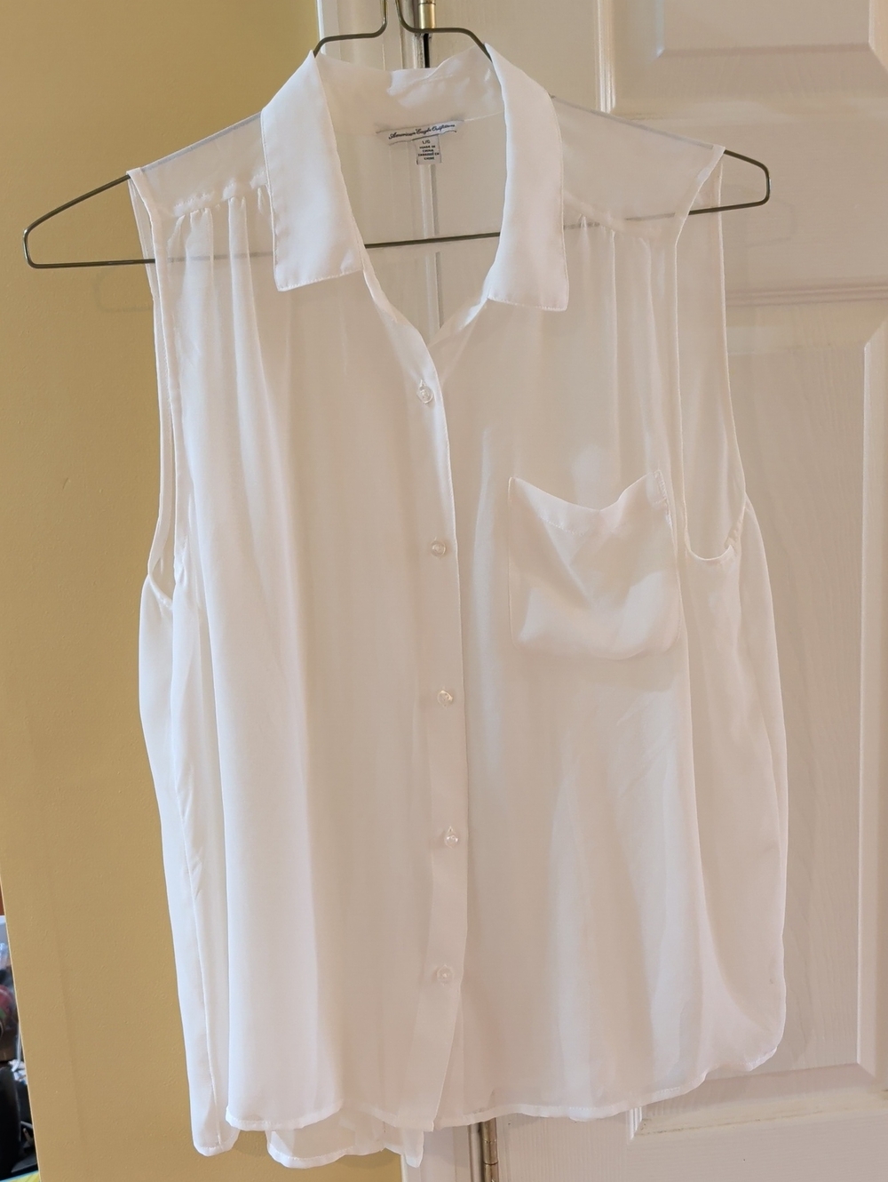 Flowy And Sheer Sleeveless Button-Front Blouse - White